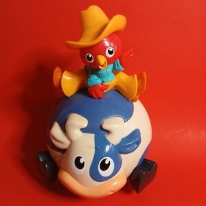 Bright Stars rodeo rooster wobbling musical toy